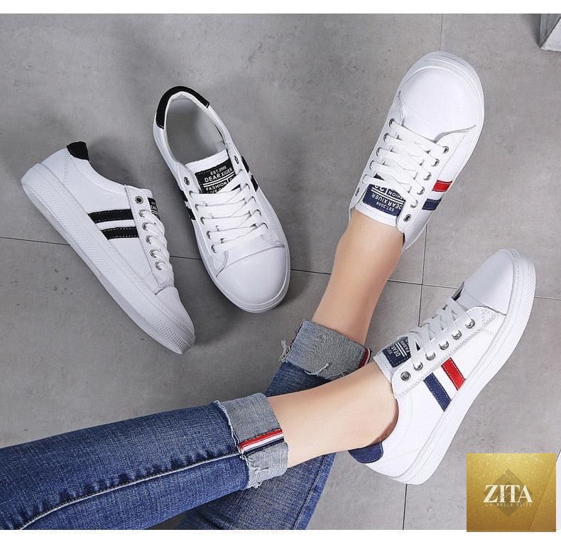Women's genuine leather sneakers by Stevvex, white casual flat tennis shoes with vulcanized sole, stylish and comfortable for everyday wear.