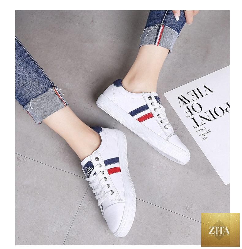 Women’s genuine leather sneakers by Stevvex, white casual sports shoes with flat soles, vulcanized construction, perfect for everyday wear.