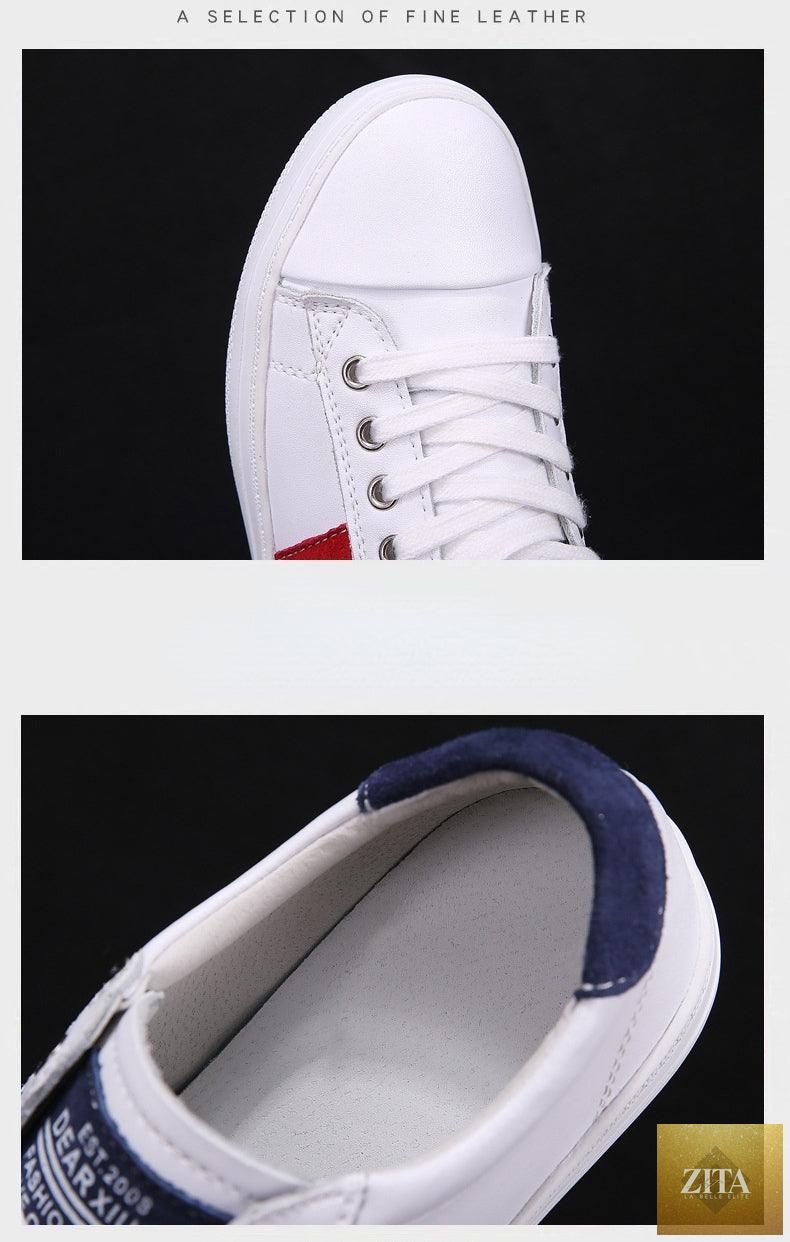 Women's white leather sneakers by Stevvex featuring casual, fashionable design with vulcanized sole and flat tennis style.