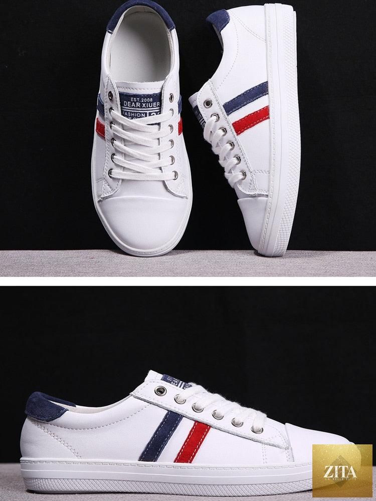 Women’s genuine leather sneakers by Stevvex featuring white casual fashion and athletic tennis style with flat soles.