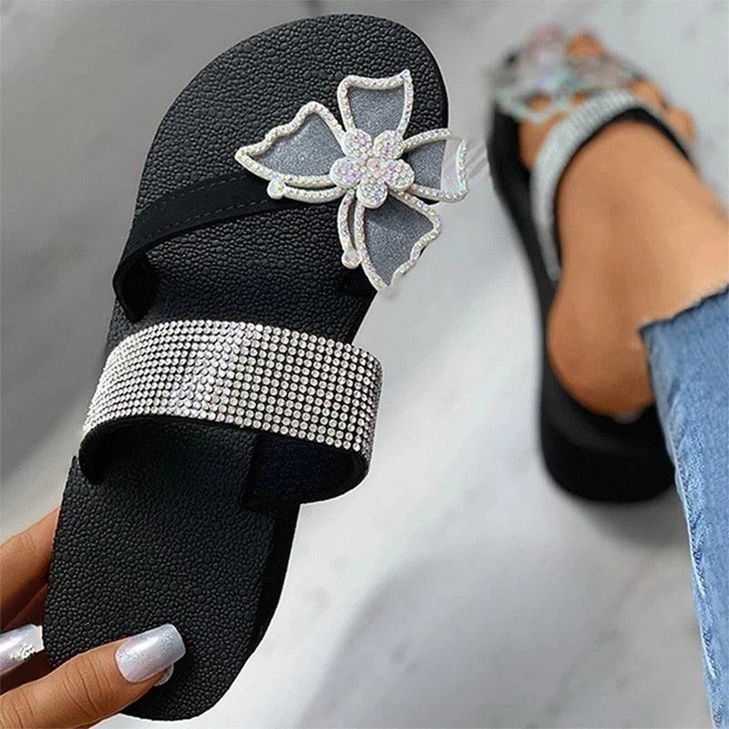 Pink women's summer sandals by Stevvex featuring open toe, butterfly design, platform sole, and comfortable dressy style.