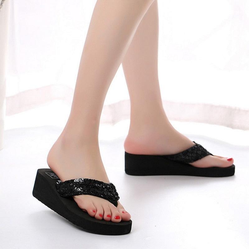 Pink women's summer sandals with open toe, butterfly design, platform heel, and modern, comfortable style by Stevvex.