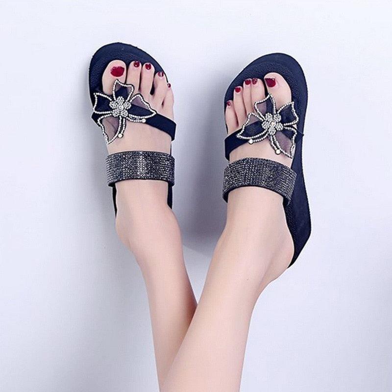 Women’s pink open-toe butterfly platform sandals by Stevvex, featuring a stylish summer design with a comfortable, modern chunky sole.