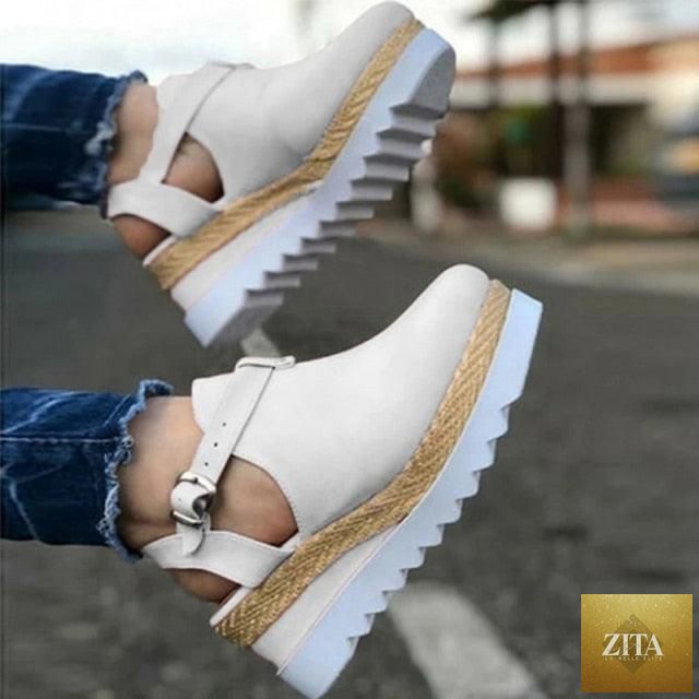Women’s vintage style flat sandals with buckle straps, straw thick soles, platform design, and retro flatform look by Stevvex.