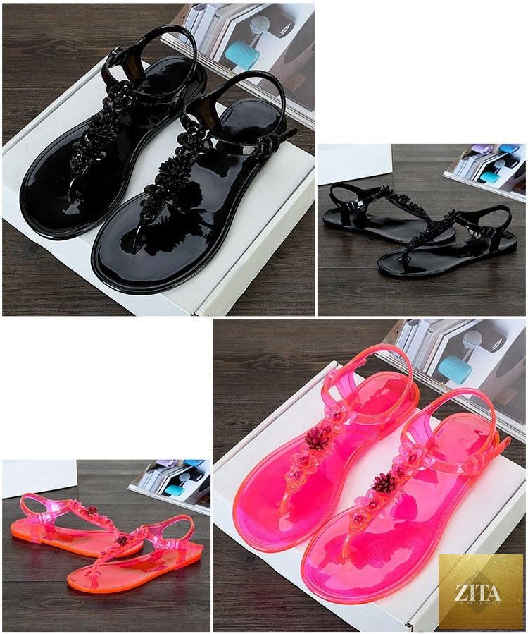 Women Stevvex summer flat flip flops with T-strap, floral design, breathable material, non-slip sole, perfect for casual beach wear.