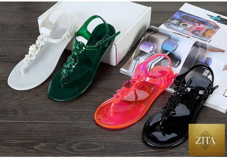 Women Stevvex summer flip flops with T-strap design, floral pattern, breathable non-slip flat slides for casual beach and dressy wear.