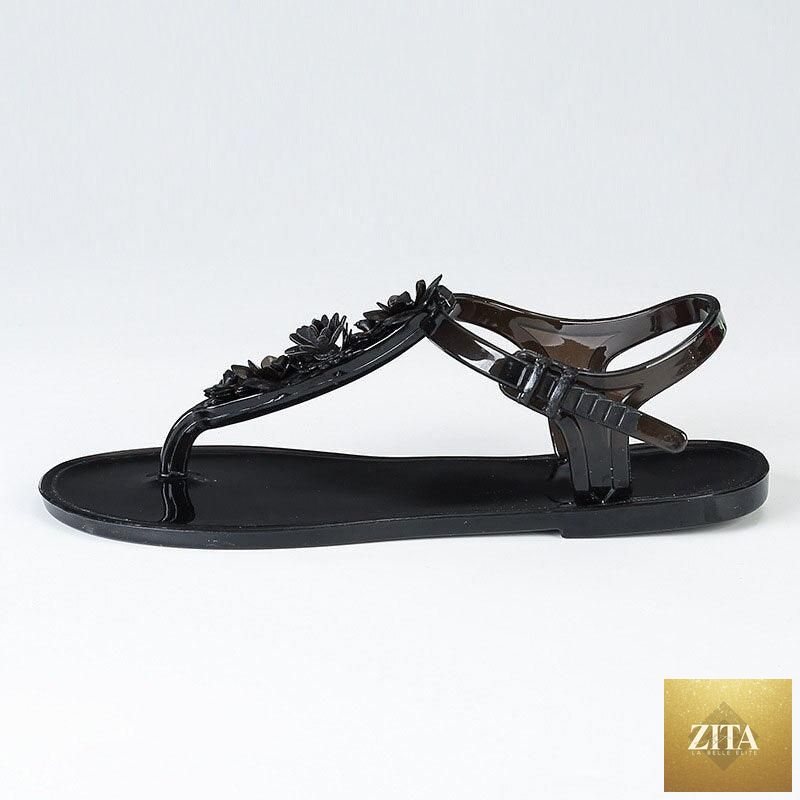Women Stevvex summer flip flops with T-strap design, breathable floral slides, non-slip flat sandals for casual beach wear.