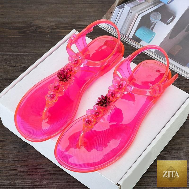 Women Stevvex summer flip flops with T-strap design, floral pattern, breathable, non-slip flat slides for casual beach or dressy wear.