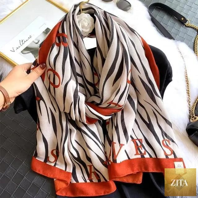Women’s leopard print cotton scarf with floral tassels, large winter shawl, warm casual wear, by Stevvex.