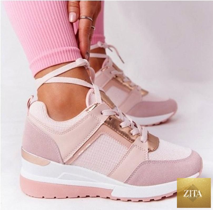 Stevvex women's leopard print lace-up sport sneakers with breathable material, height increase, ideal for walking and jogging.