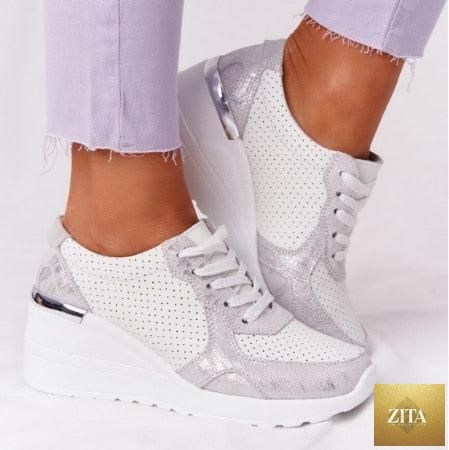 Women’s leopard print Sport Running Sneakers by Stevvex with breathable fabric, lace-up design, and height-increasing soles for walking and jogging.