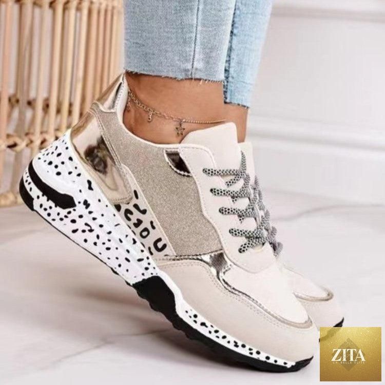 Stevvex women’s leopard print sneakers with lace-up design, breathable material, height-increasing sole, suitable for running and walking.
