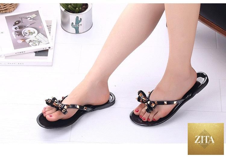 Women Stevvex summer flip flops with flat thong straps and soft soles, perfect for beach and casual summer wear.