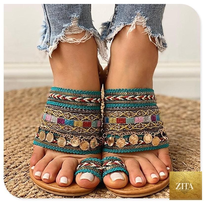 Women’s summer flat slippers by Stevvex with open toe, strappy design, shiny leather, ideal for casual beachwear and comfortable wear.