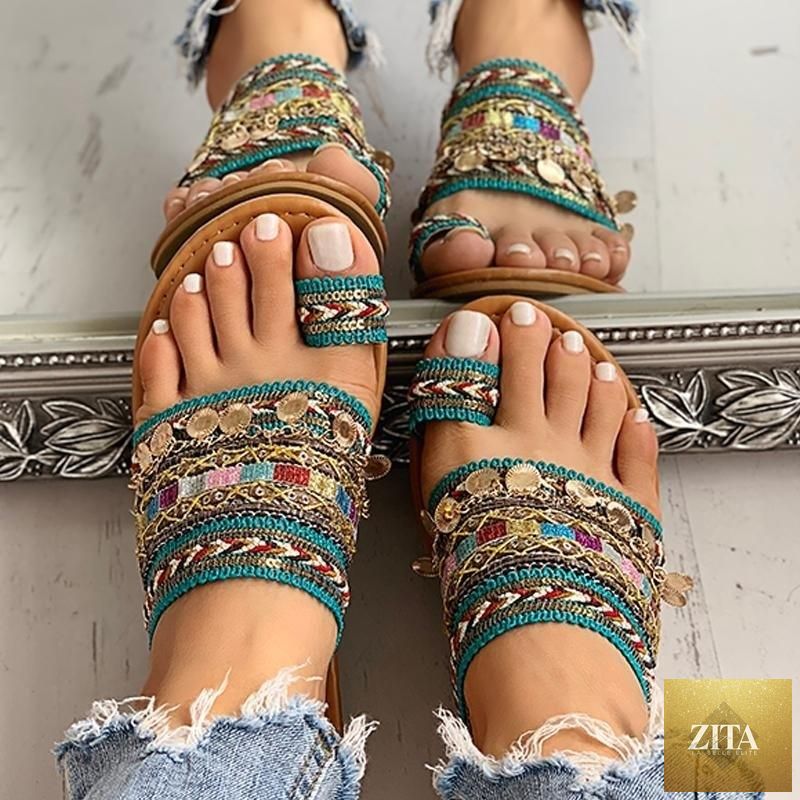 Women’s flat summer beach sandals by Stevvex featuring strappy open toe leather shoes with shiny finish and comfortable wide fit.