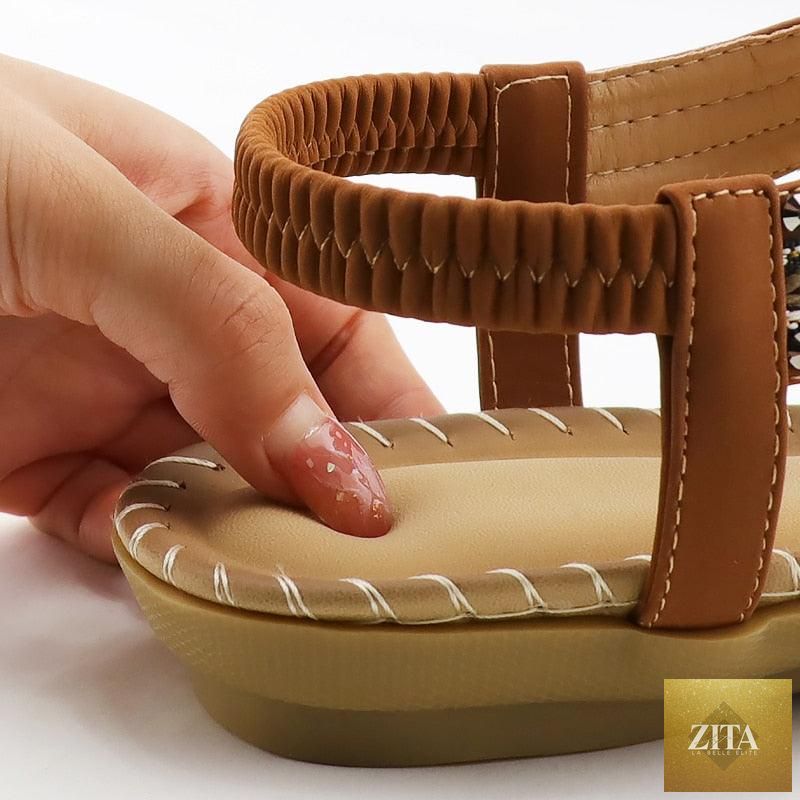 Women’s summer vintage sandals by Stevvex featuring butterfly-knot design, rhinestones, elastic ankle strap, slip-on beach casual flats.