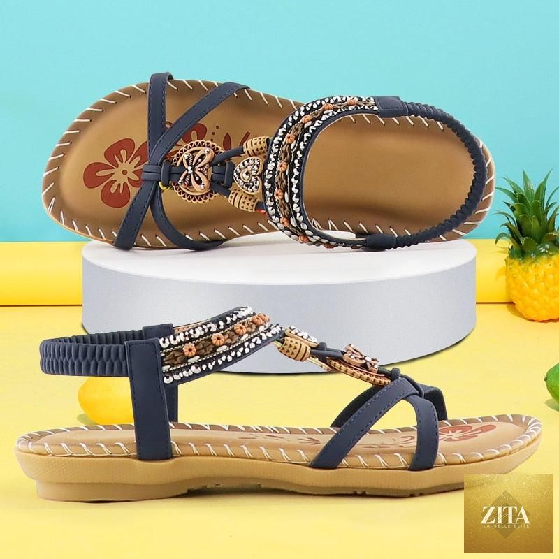 Women’s summer vintage sandals by Stevvex with butterfly-knot design, rhinestones, elastic ankle strap, slip-on flats for casual beach wear.
