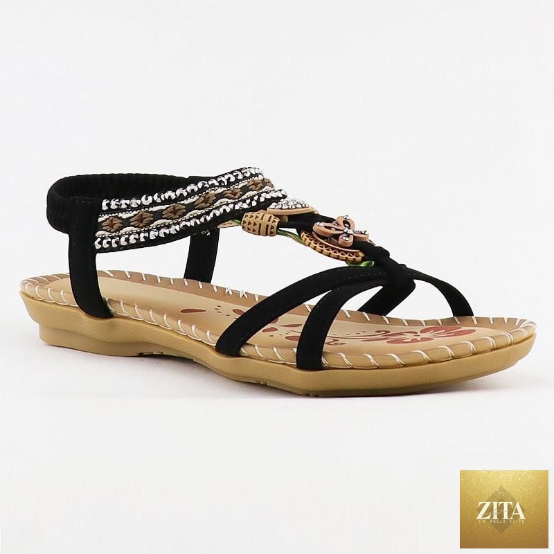 Women’s summer vintage sandals by Stevvex featuring butterfly knot design, rhinestones, elastic ankle strap, slip-on style, casual beach shoes.