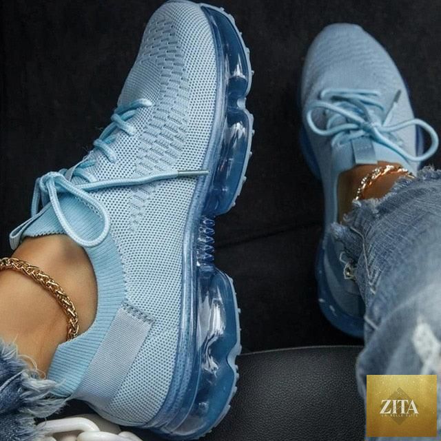 Women Stevvex trendy sneakers with breathable cushion soles, lace-up design, ideal for running, outdoor sports, and casual wear.