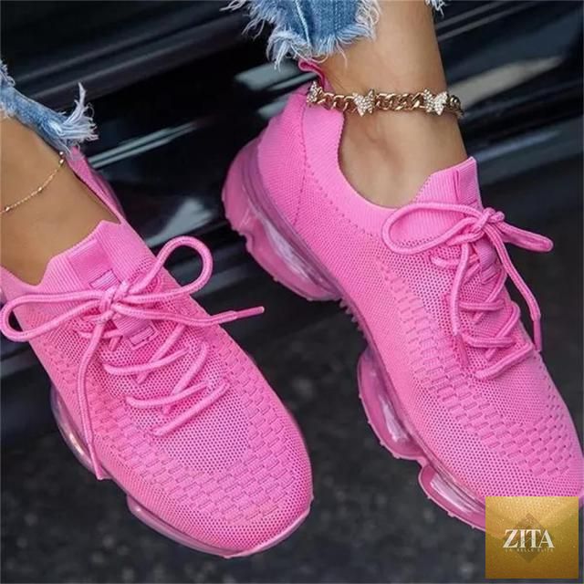 Women Stevvex trendy sneakers with cushion support, lace-up design, breathable fabric, perfect for running and outdoor sports.