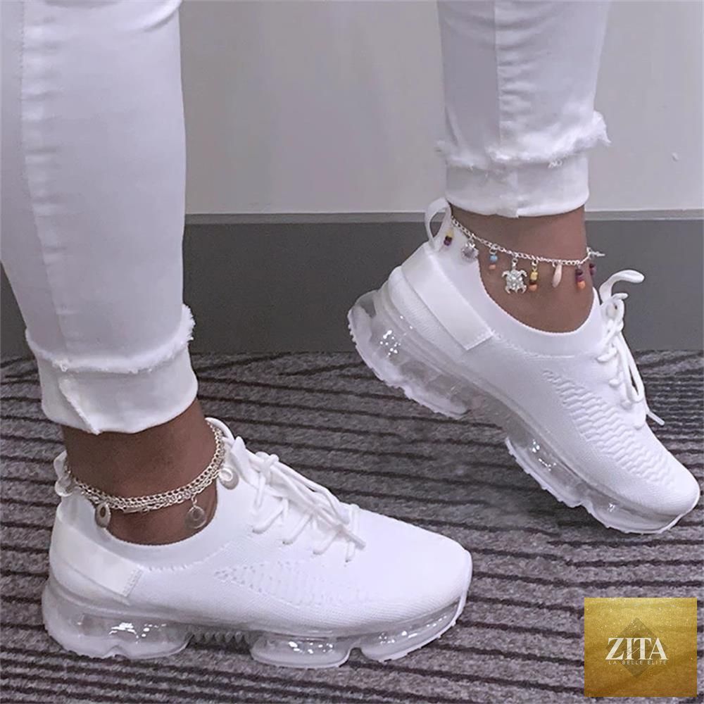 Women Stevvex trendy sneakers with cushion soles, lace-up design, breathable fabric, ideal for running, sports, and outdoor activities.