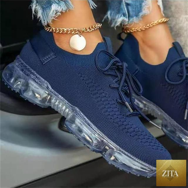 Women Stevvex trendy sneakers with cushion soles, lace-up design, breathable fabric, ideal for running, outdoor sports, and casual wear.