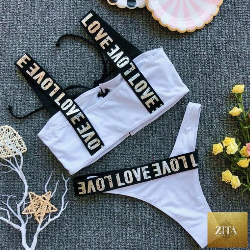 Women’s two-piece push-up bikini by Stevvex featuring high waist, crisscross halter top, letter print, and backless beach swimwear.