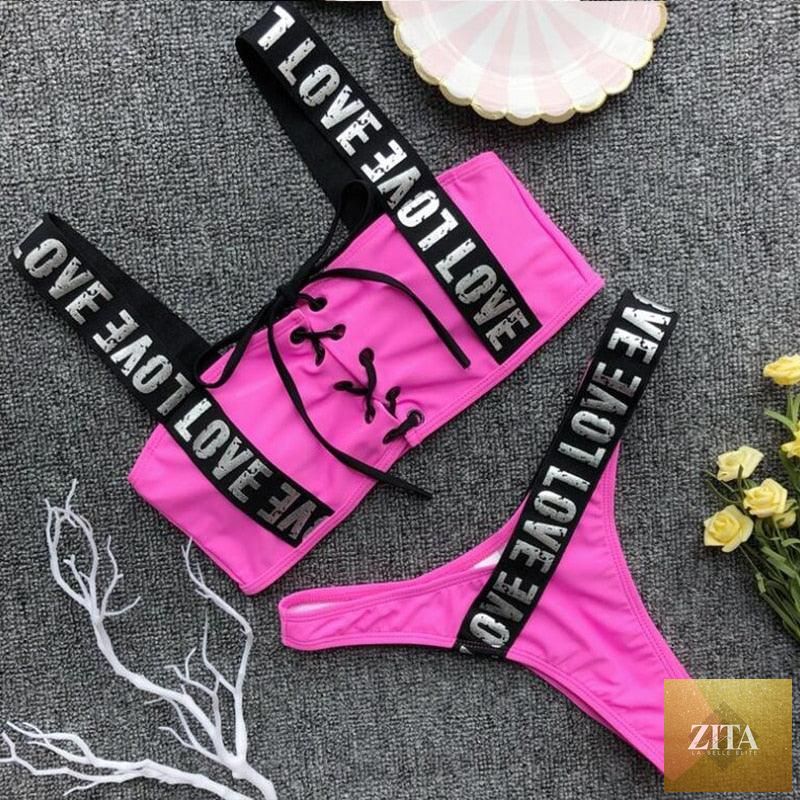 Women’s two-piece high-waist push-up bikini with crisscross halter top, letter print, and backless design by Stevvex.