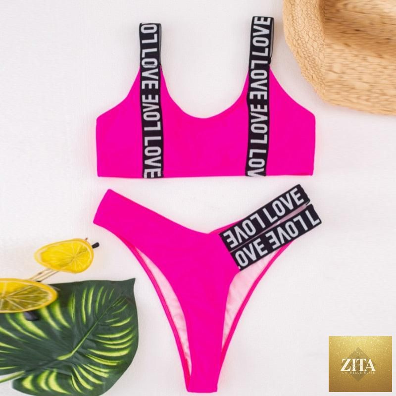 Women’s high-waist two-piece swimsuit by Stevvex featuring push-up bikini top, crisscross halter, letter print, and backless beachwear.