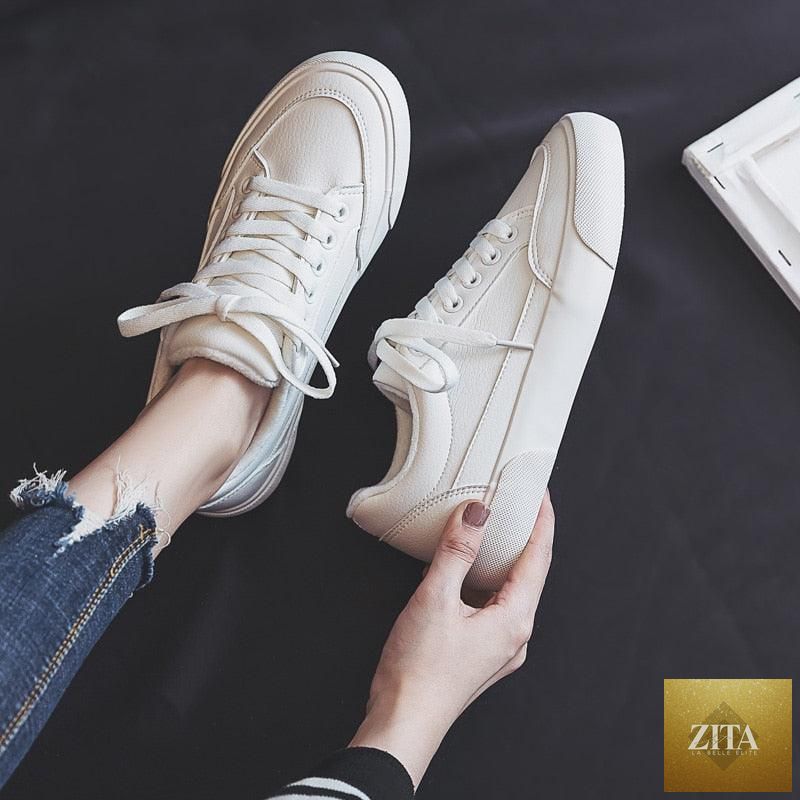 Women’s white Stevvex business sneakers with air mesh, platform sole, lightweight design, casual sporty style, and non-slip sole.