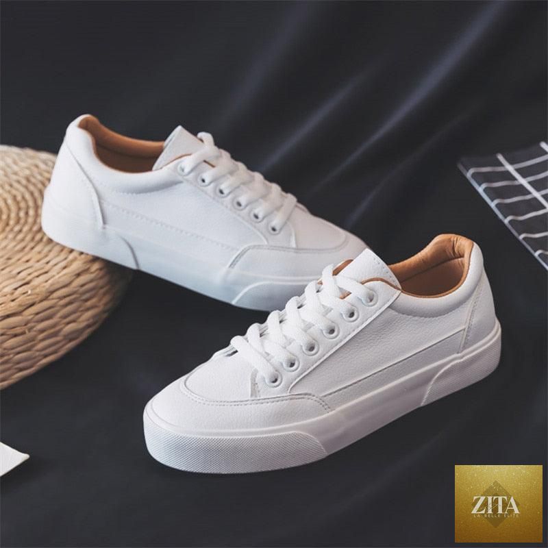 Women’s white Stevvex business sneakers with air mesh, platform, lightweight design, non-slip sole, ideal for casual spring walks.