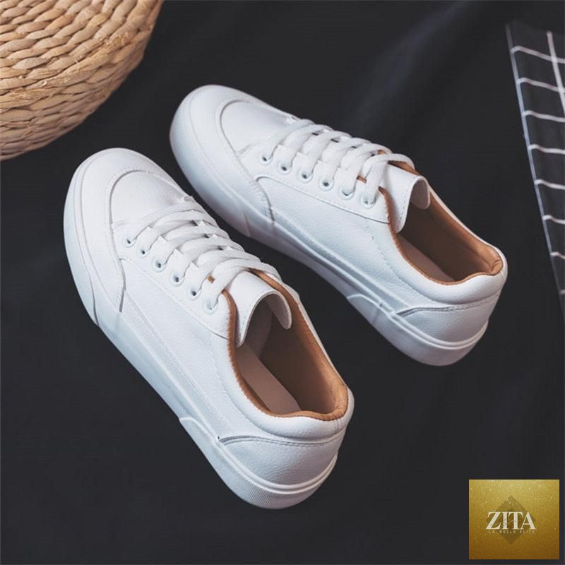 Women’s white Stevvex business sneakers with air mesh, platform sole, lightweight design, casual sport style, and non-slip sole.