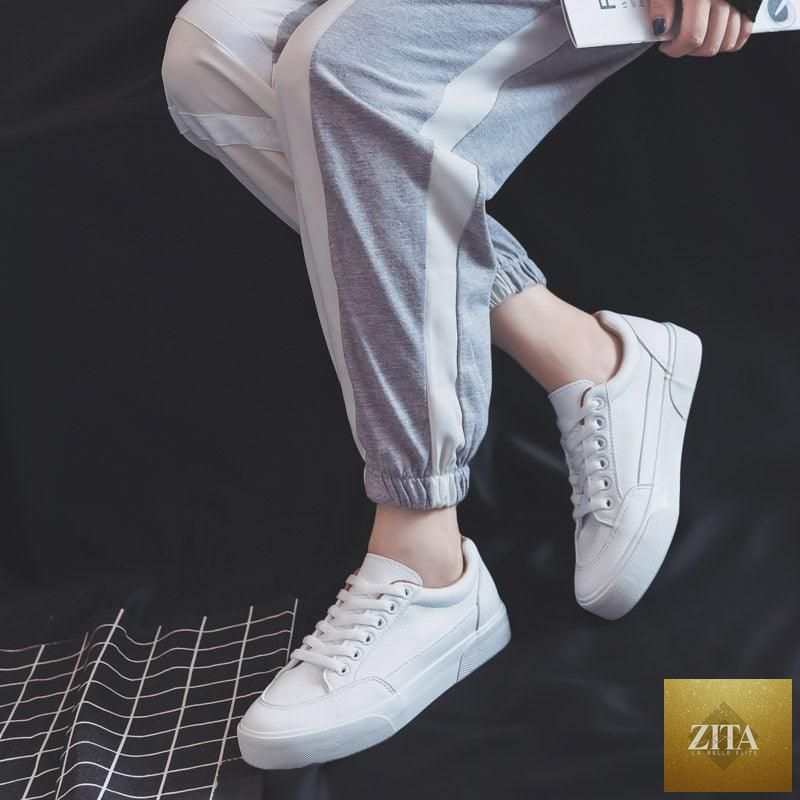 Women Stevvex white business sneakers with air mesh, lightweight, non-slip soles, stylish platform design, perfect for casual spring walks.