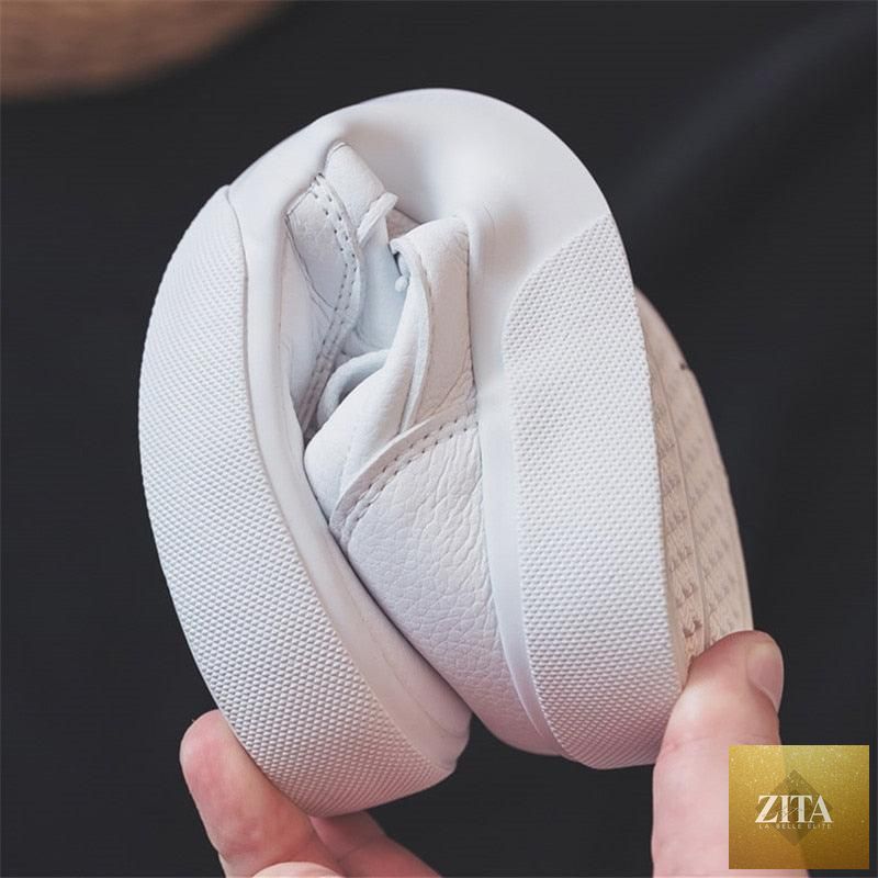 Women’s white Stevvex business sneakers with air mesh, lightweight and non-slip, perfect for casual spring walking and comfort.