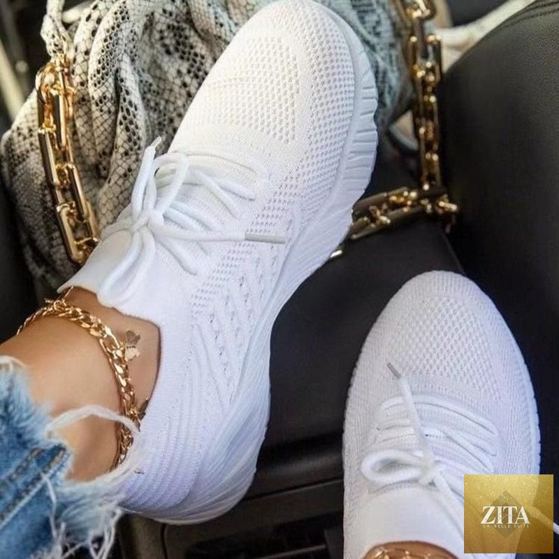 Women Stevvex white sneakers with thick soles, breathable mesh, lace-up design, lightweight and comfortable for summer outdoor wear.