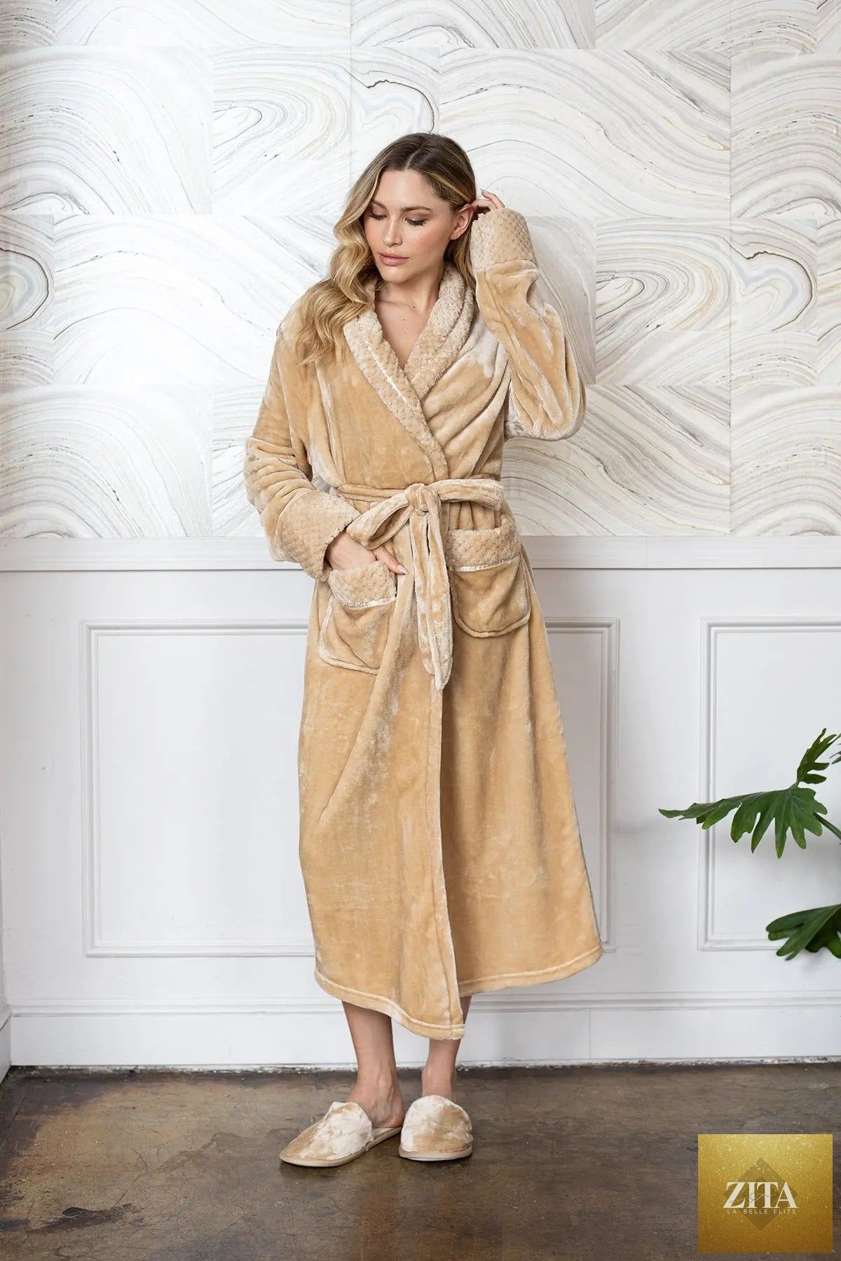 Women’s ultra-soft plush bathrobe by Lotus Linen, showing cozy, luxurious fabric and relaxed fit for comfortable lounging.
