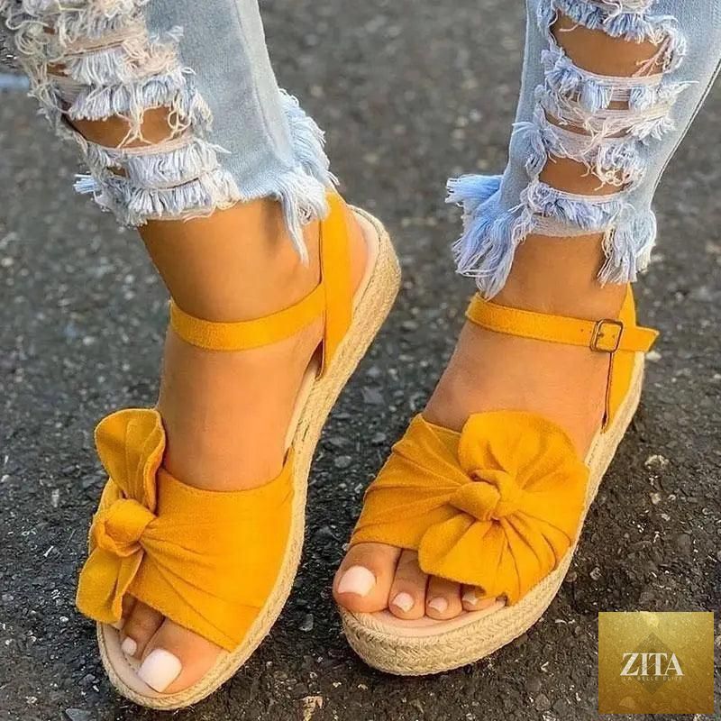 Stevvex women's casual stylish summer flats sandals with buckle straps, featuring elegant comfort and fashion design.