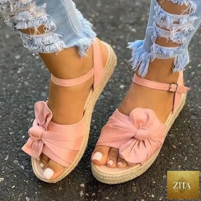 Stylish women's casual summer sandals with buckle straps, flat design, comfortable fit, by Stevvex.