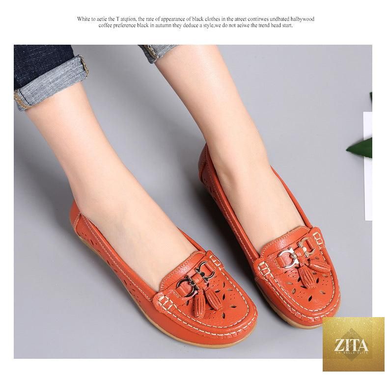 Women's Stevvex espadrilles with genuine leather upper, slip-on design, low heels, and comfortable spring casual style.