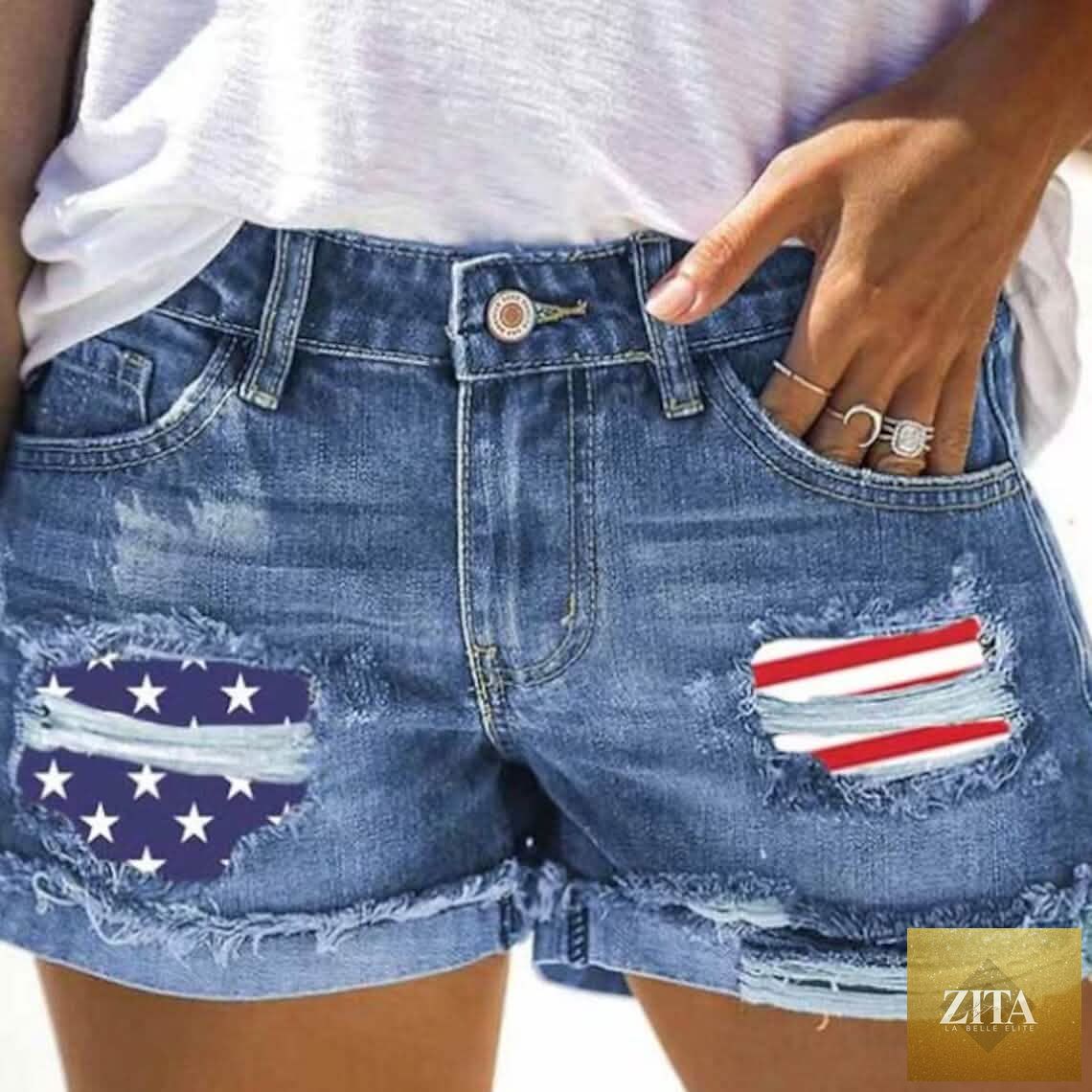 Women's denim shorts with Independence Day theme from Zita La Belle Elite, featuring distressed details and a casual fit.