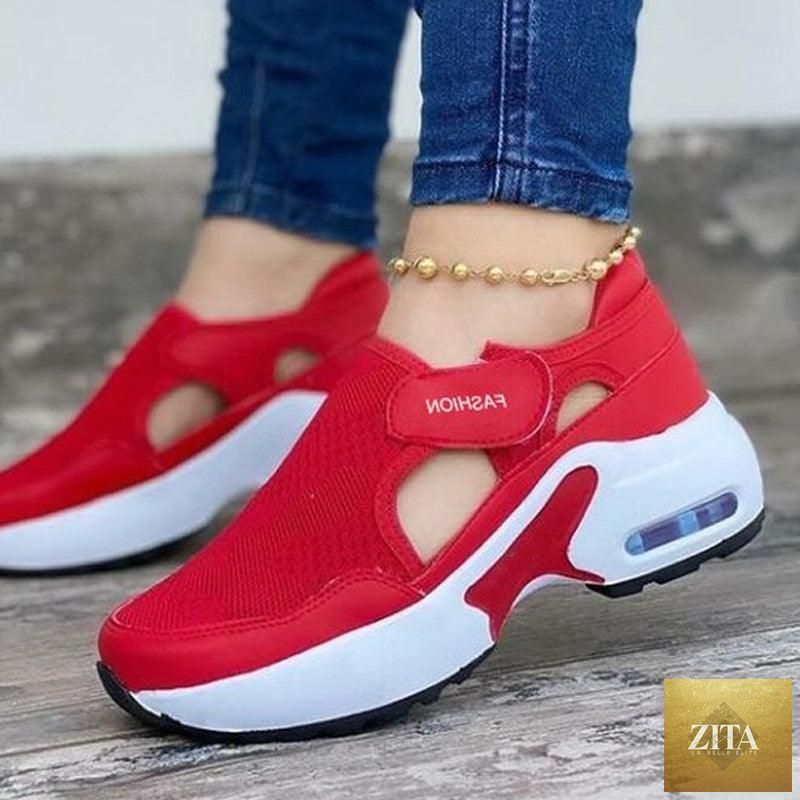 Women’s red mesh sneakers from Stevvex with breathable, lightweight air cushion soles, non-slip, casual and athletic for gym and running.