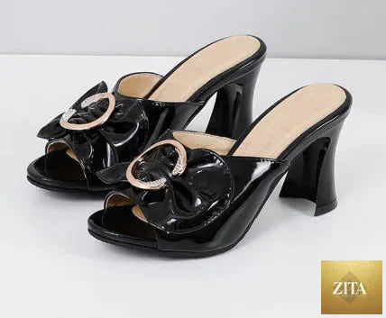 Women thick-heeled rhinestone sandals with open-toe design and stylish strap details from Trendy Attic Store01.