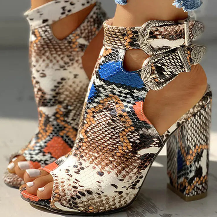 Large women's sandals with high thick heels from Trendy Attic Store01, featuring open-toe design and stylish straps.