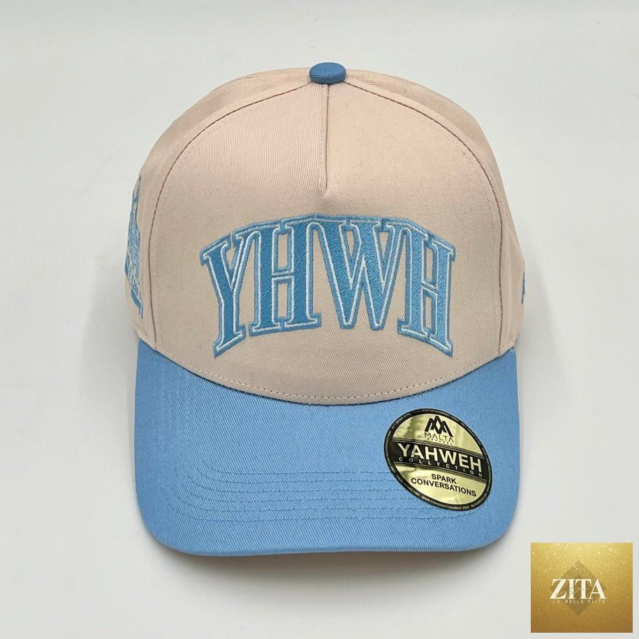 Malta Apparel YHWH structured snapback hat in cream and baby blue with embroidered front design.