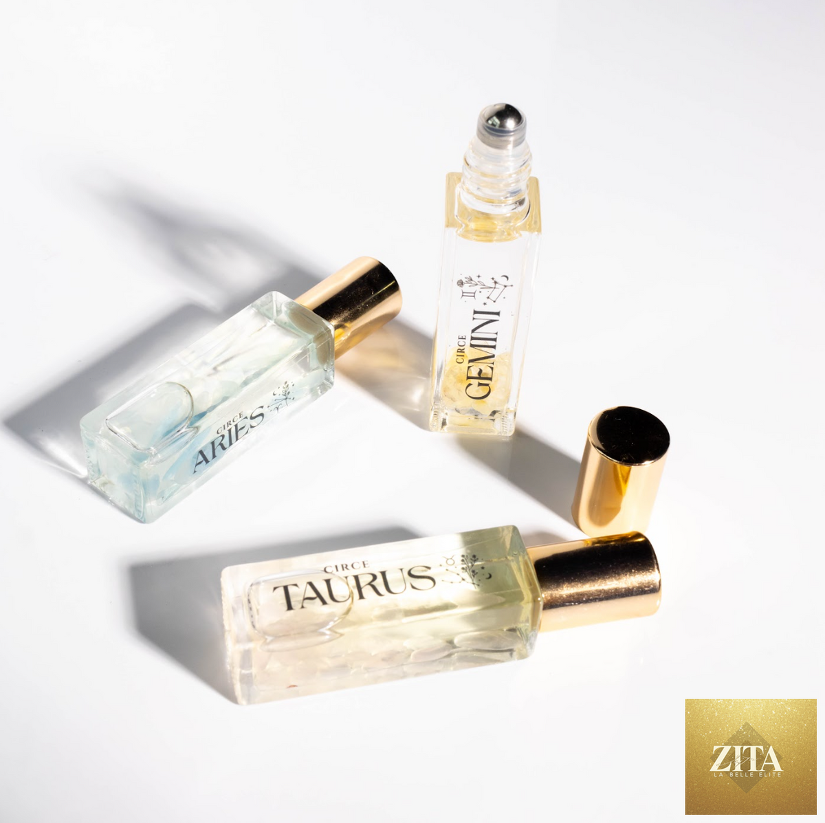 Zita La Belle Elite Zodiac Perfume Oil Set with 12 gemstone-infused scents, featuring zodiac symbols and elegant packaging.