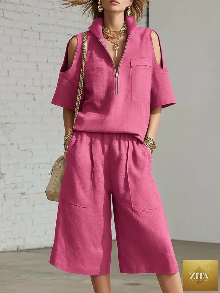 MERIDGE short-sleeve shirt and loose shorts two-piece set displayed on a model, casual summer outfit with relaxed fit.