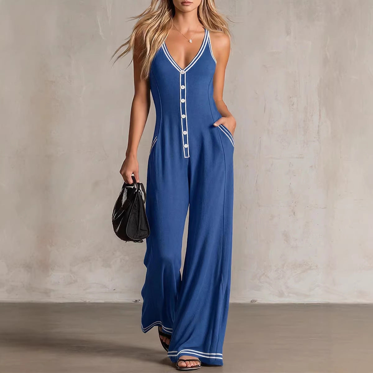 Women's FitiqueFit V-neck backless wide-leg jumpsuit with high waist, casual style, shown from the front on a plain background.