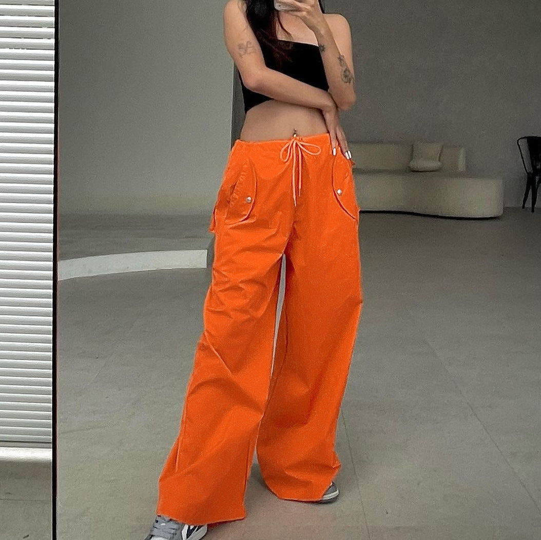 Women's high-waist lace-up straight-leg cargo pants by FitiqueFit, showcasing a loose fit and casualwear style.