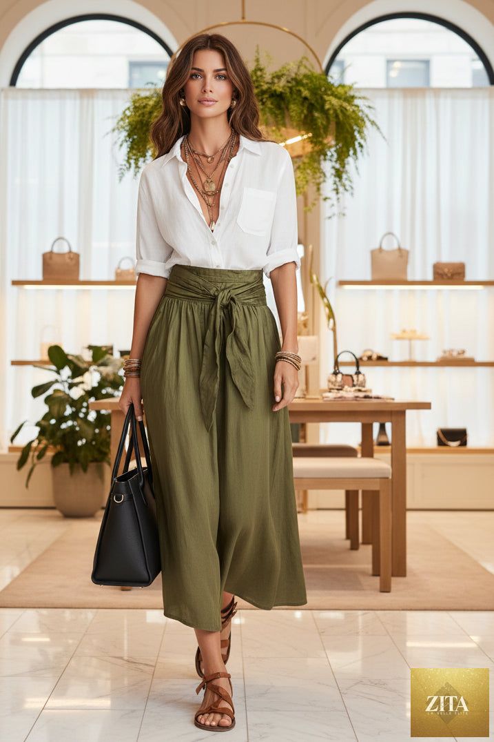MERIDGE two-piece set with a button-down shirt and high-waist tie skirt, shown in a stylish, coordinated outfit.