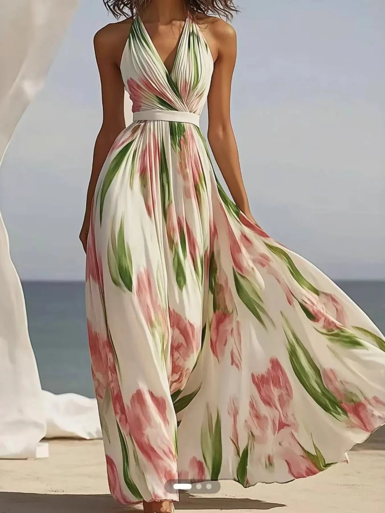 Floral print halter neck maxi dress by Shopiebay featuring a flowing design and vibrant floral pattern.